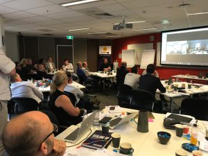Team listening during the conference